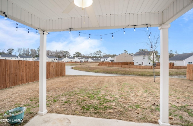 view of yard featuring ceiling fan