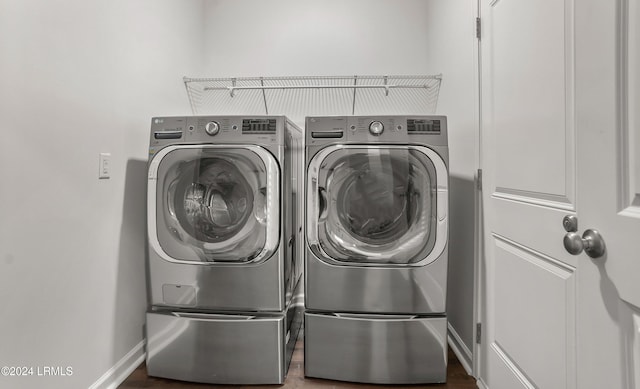 laundry area with washer and dryer