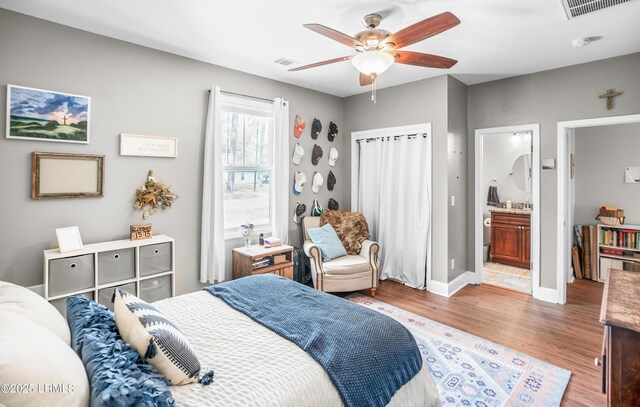 3010 Palmetto Ridge St, Beaufort, SC 29906 - bedroom featuring visible vents, baseboards, ensuite bathroom, a ceiling fan, and light wood finished floors