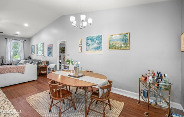 3010 Palmetto Ridge St, Beaufort, SC 29906 - dining room featuring wood finished floors, an inviting chandelier, baseboards, and lofted ceiling