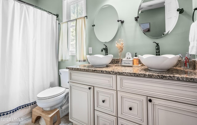3010 Palmetto Ridge St, Beaufort, SC 29906 - bathroom with a sink, toilet, double vanity, and a shower with shower curtain