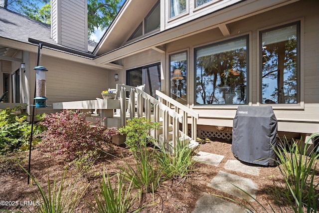 2009 Bluff Villas Rd, Saint Helena Island, SC 29920 - view of exterior entry featuring a chimney