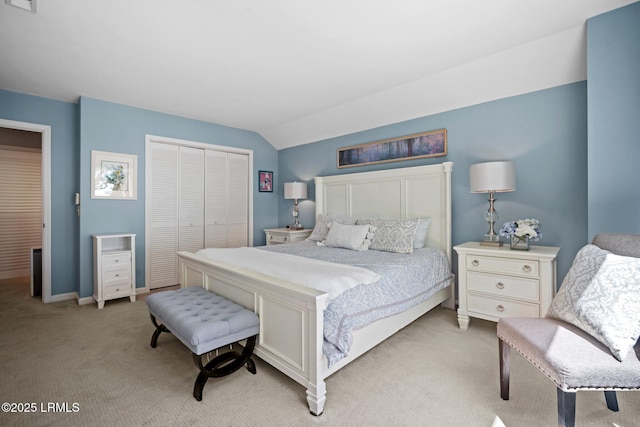 2009 Bluff Villas Rd, Saint Helena Island, SC 29920 - bedroom featuring a closet, light colored carpet, lofted ceiling, and baseboards