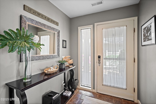 2009 Bluff Villas Rd, Saint Helena Island, SC 29920 - foyer featuring stone tile floors