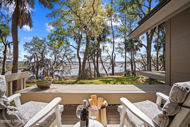 2009 Bluff Villas Rd, Saint Helena Island, SC 29920 - wooden terrace with a water view