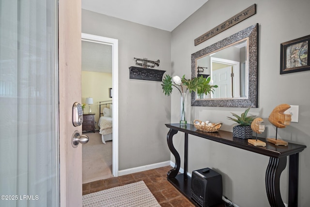 2009 Bluff Villas Rd, Saint Helena Island, SC 29920 - foyer entrance featuring baseboards and dark stone finish flooring