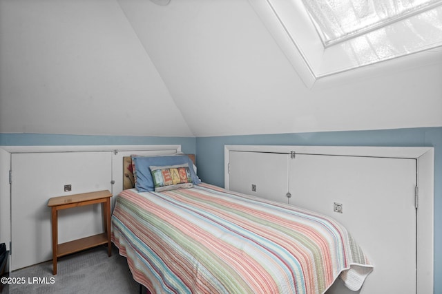 2009 Bluff Villas Rd, Saint Helena Island, SC 29920 - carpeted bedroom featuring a skylight and vaulted ceiling