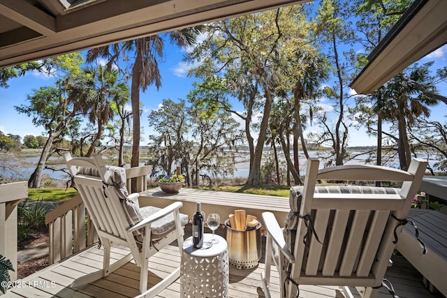 2009 Bluff Villas Rd, Saint Helena Island, SC 29920 - wooden deck with a water view