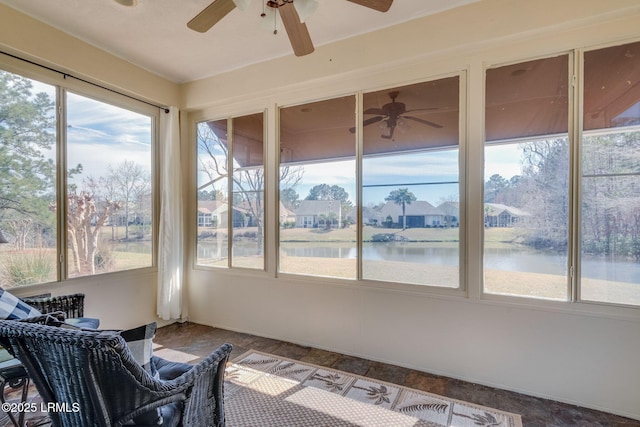 sunroom with a water view