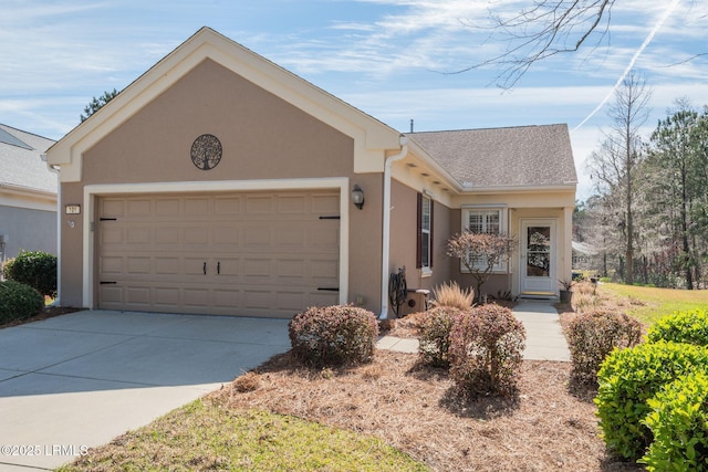 ranch-style house with stucco siding, a garage, roof with shingles, and driveway