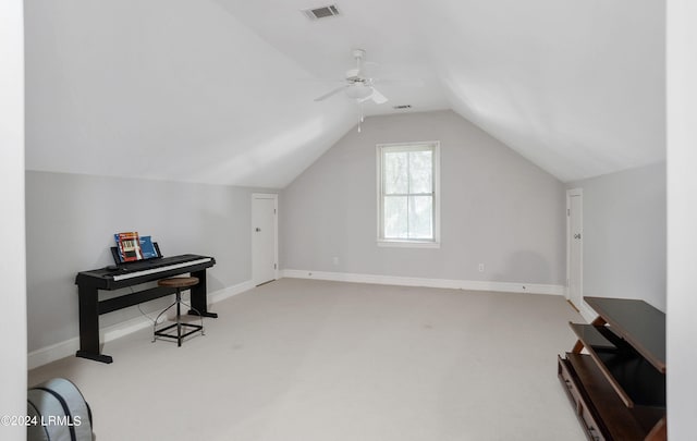 bonus room with vaulted ceiling, carpet, and ceiling fan