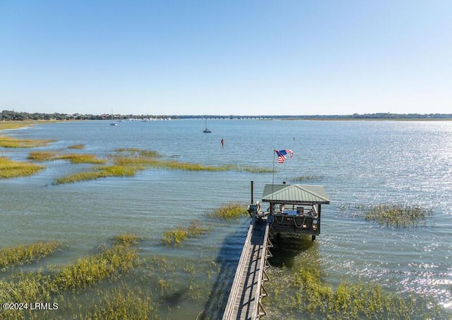 dock area featuring a water view