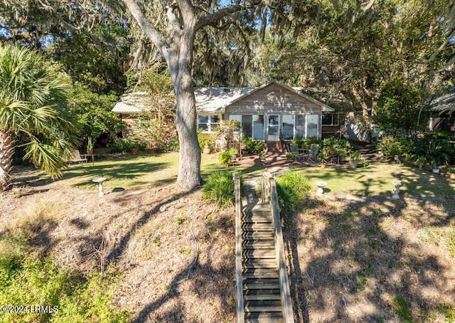 view of front of house with a front yard