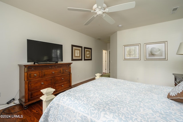 bedroom featuring ceiling fan and dark hardwood / wood-style flooring