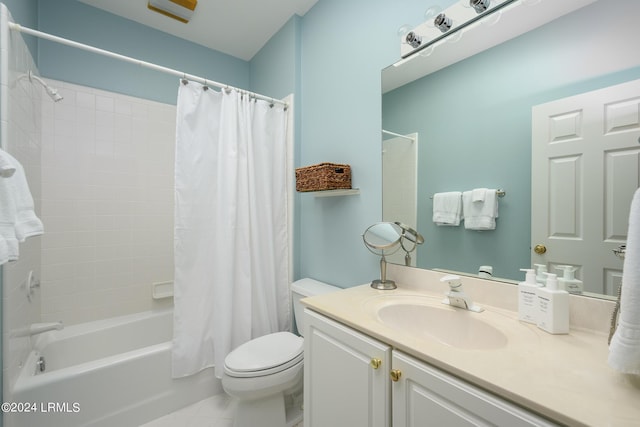 full bathroom featuring vanity, toilet, and shower / bathtub combination with curtain