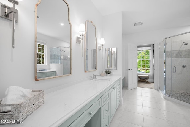 714 Island Cir E, Saint Helena Island, SC 29920 - full bathroom with vanity, plenty of natural light, a shower stall, and tile patterned flooring