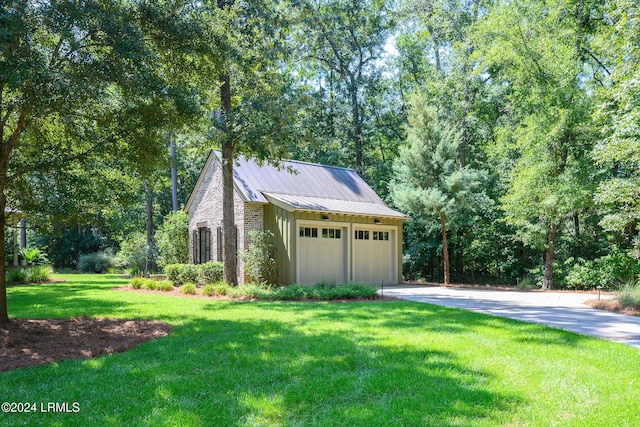 garage with a yard