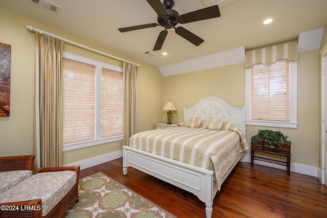 bedroom with dark wood-type flooring, ceiling fan, and lofted ceiling