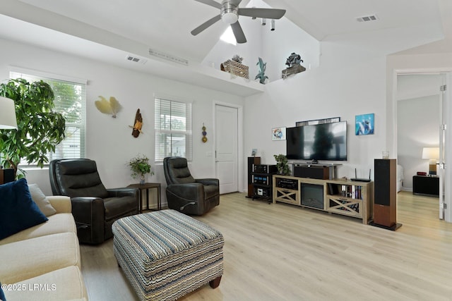 220 Sandbar Ln Unit 101, Hardeeville, SC 29927 - living room featuring wood finished floors, a ceiling fan, and a high ceiling