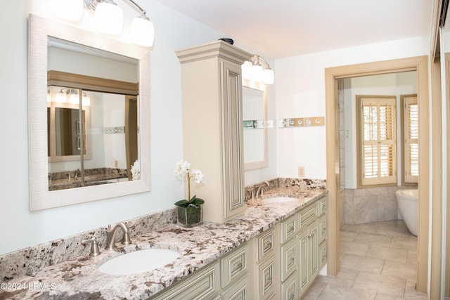 bathroom with vanity and tile patterned floors