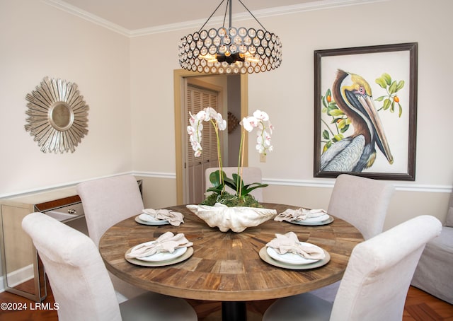 dining room with crown molding and parquet floors