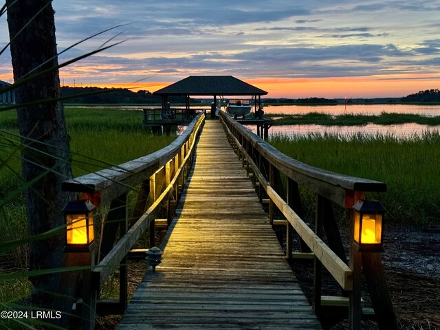 view of dock with a water view