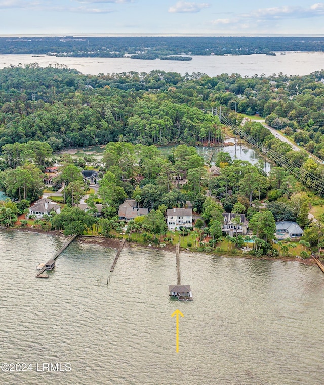 birds eye view of property featuring a water view