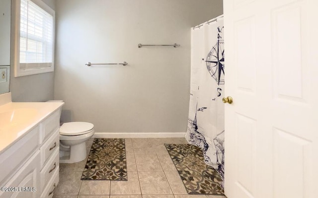 1003 9th St, Port Royal, SC 29935 - full bath featuring vanity, tile patterned floors, and a shower with shower curtain