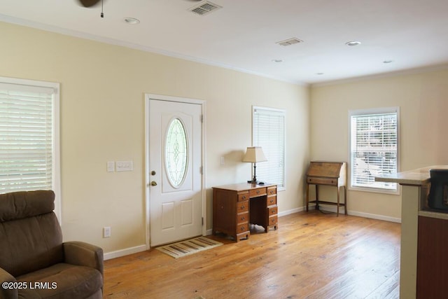 1003 9th St, Port Royal, SC 29935 - entryway with crown molding, light wood finished floors, recessed lighting, and a ceiling fan