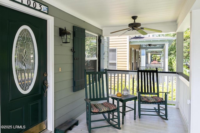 1003 9th St, Port Royal, SC 29935 - wooden porch featuring a ceiling fan
