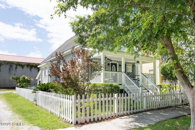 1003 9th St, Port Royal, SC 29935 - view of front of property with covered porch, stairs, and a fenced front yard