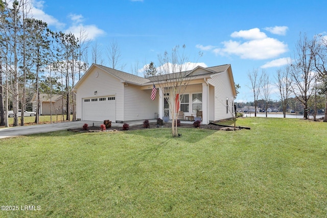 view of front of house featuring a garage and a front yard