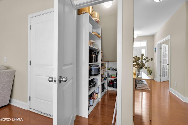 1216 Hearthstone Dr, Ridgeland, SC 29936 - hall with baseboards and wood finished floors