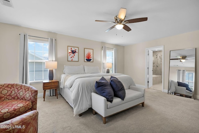 1216 Hearthstone Dr, Ridgeland, SC 29936 - bedroom with ceiling fan, light colored carpet, visible vents, baseboards, and ensuite bath
