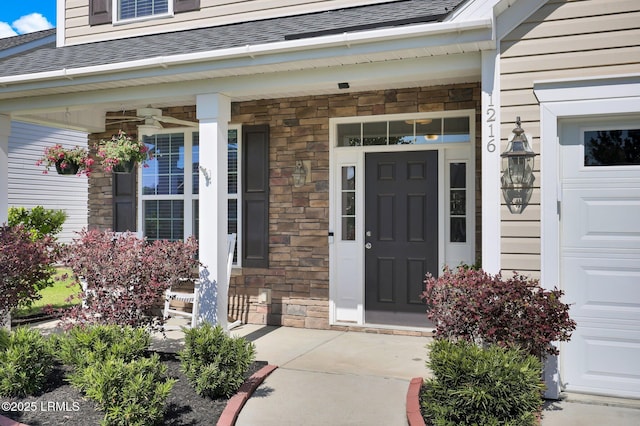 1216 Hearthstone Dr, Ridgeland, SC 29936 - doorway to property featuring covered porch, a shingled roof, and stone siding