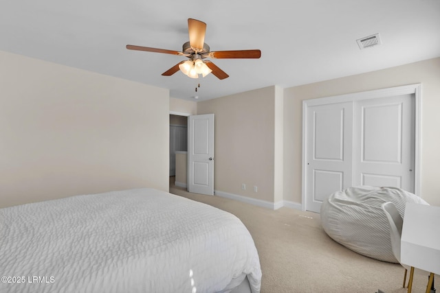 1216 Hearthstone Dr, Ridgeland, SC 29936 - bedroom with visible vents, a closet, light carpet, baseboards, and ceiling fan