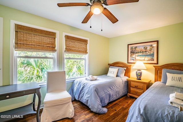 262 Deer Run Ln, Fripp Island, SC 29920 - bedroom with multiple windows, wood finished floors, and ceiling fan