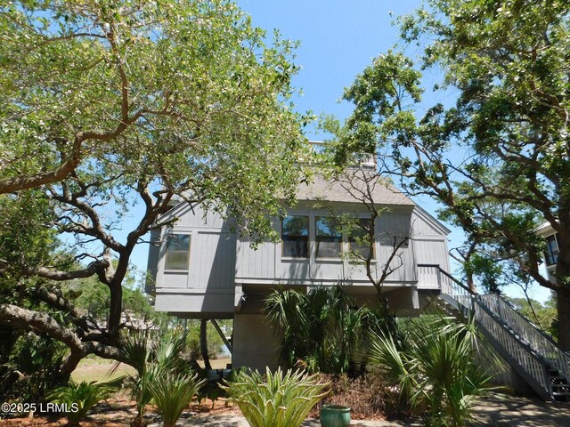 262 Deer Run Ln, Fripp Island, SC 29920 - rear view of house with stairway