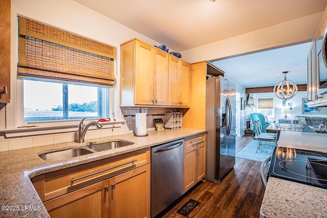 262 Deer Run Ln, Fripp Island, SC 29920 - kitchen featuring appliances with stainless steel finishes, a sink, dark wood-style floors, and backsplash