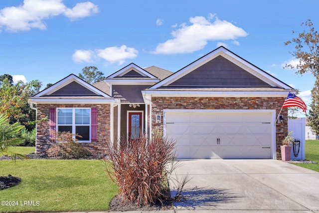 view of front facade with a garage and a front yard