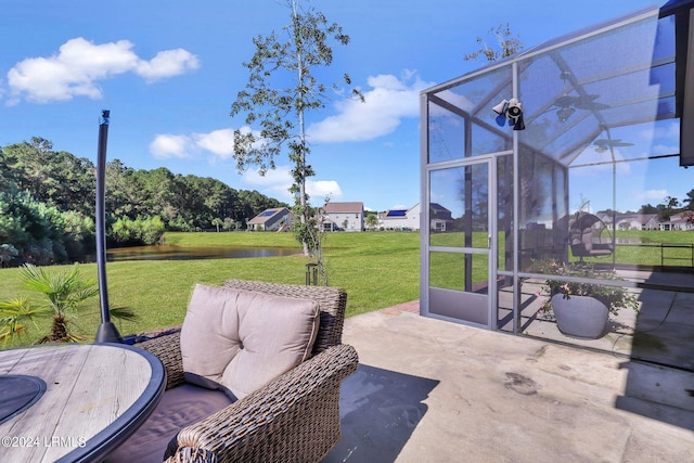 view of patio with glass enclosure