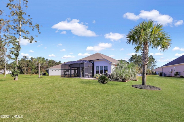 view of yard featuring glass enclosure