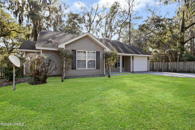 ranch-style house featuring an attached garage, driveway, a front yard, and fence