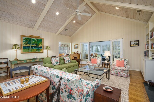 living room with high vaulted ceiling, ceiling fan, light hardwood / wood-style floors, wooden ceiling, and beam ceiling