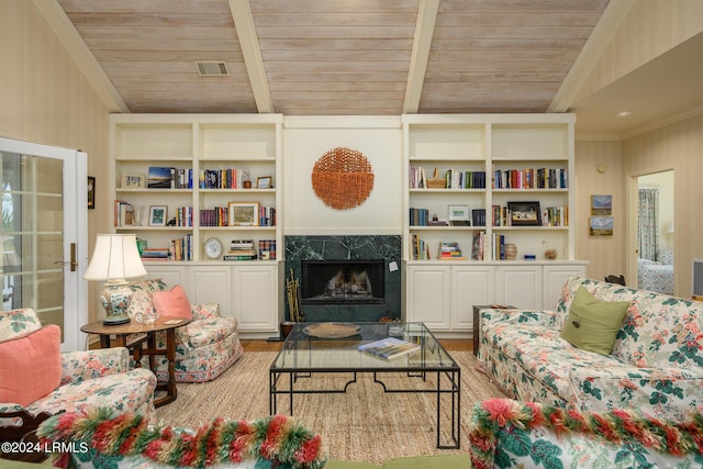 living room with lofted ceiling with beams, a premium fireplace, wood ceiling, and light hardwood / wood-style flooring