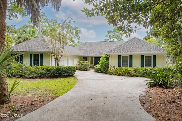 single story home with a garage