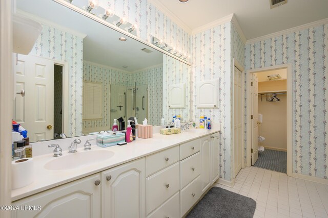 bathroom featuring walk in shower, toilet, ornamental molding, vanity, and tile patterned flooring