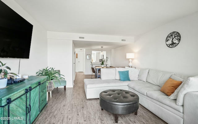 living room with hardwood / wood-style flooring