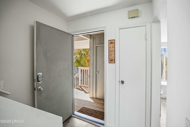 doorway to outside with hardwood / wood-style floors