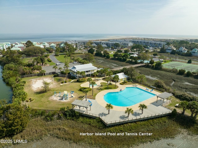 view of pool featuring a water view